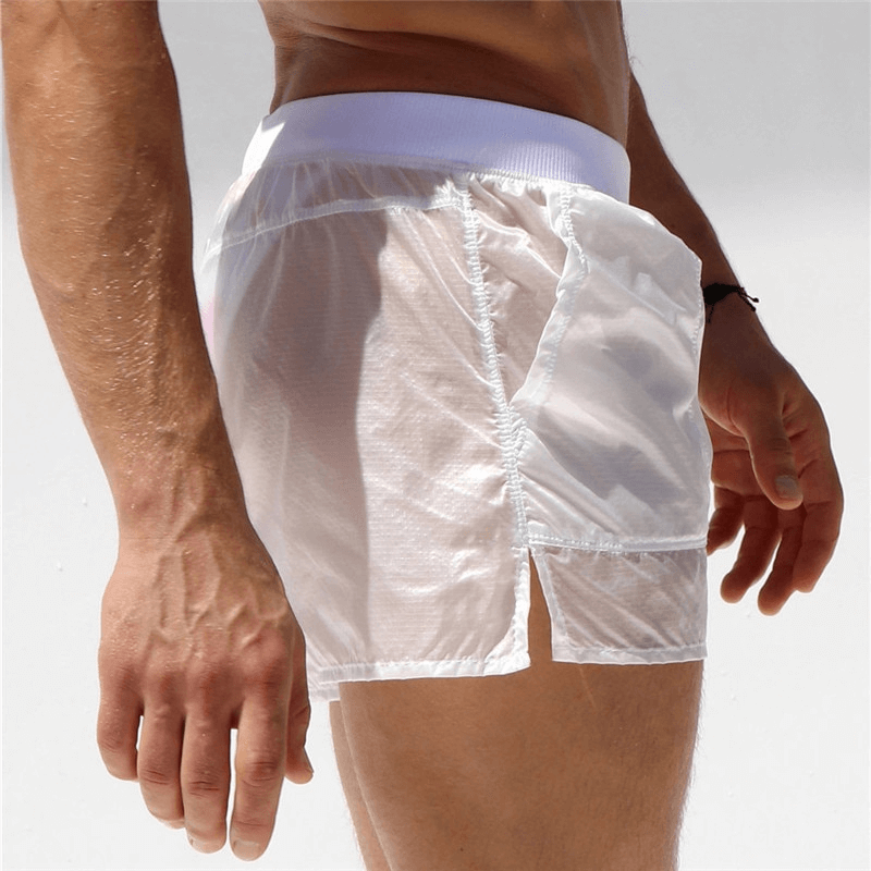Stylish quick dry beach men's swimming shorts in white, designed for comfort and speed with modern solid pattern. Perfect for beach days.